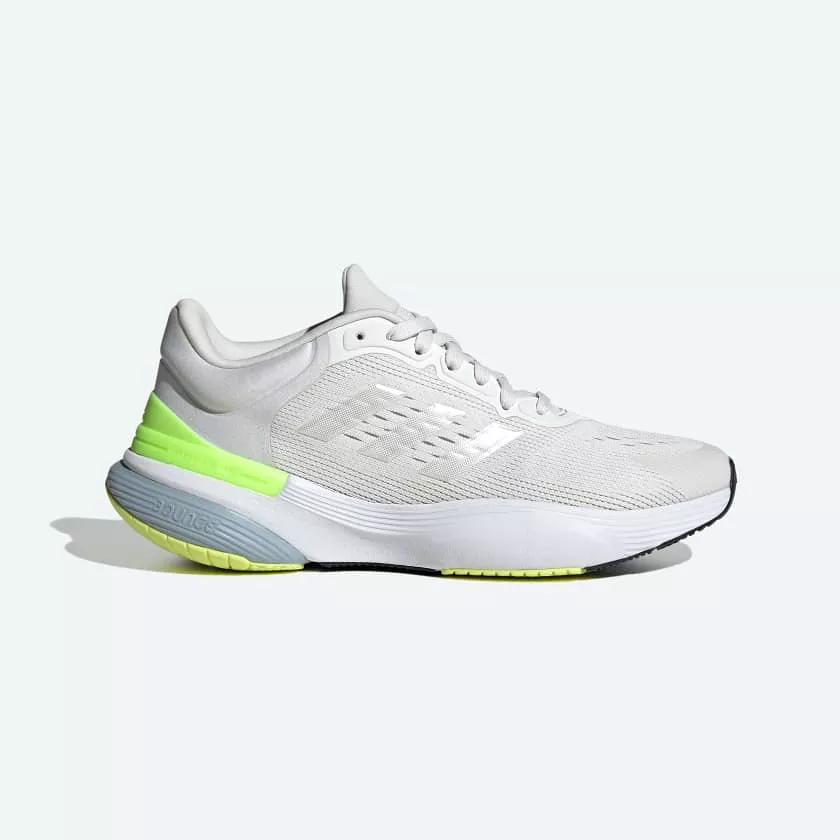 Adidas women's running shoes in white and green