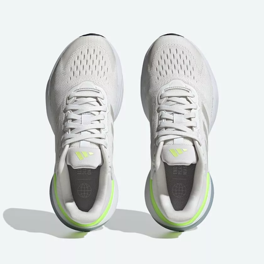 Adidas women's running shoes in white and green