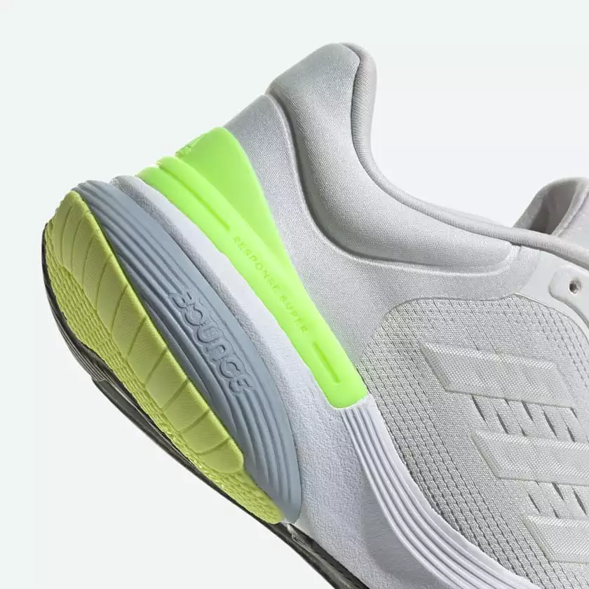 Adidas women's running shoes in white and green