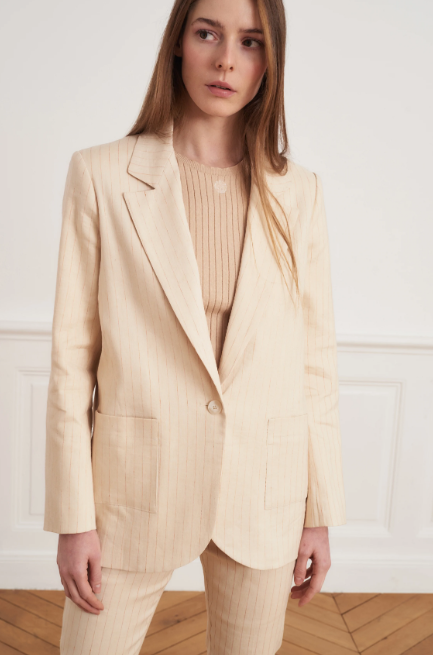 Beige striped blazer with a borsalino hat design.