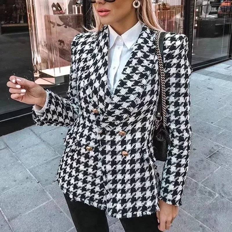 Black and white houndstooth blazer coat, gold buttons.