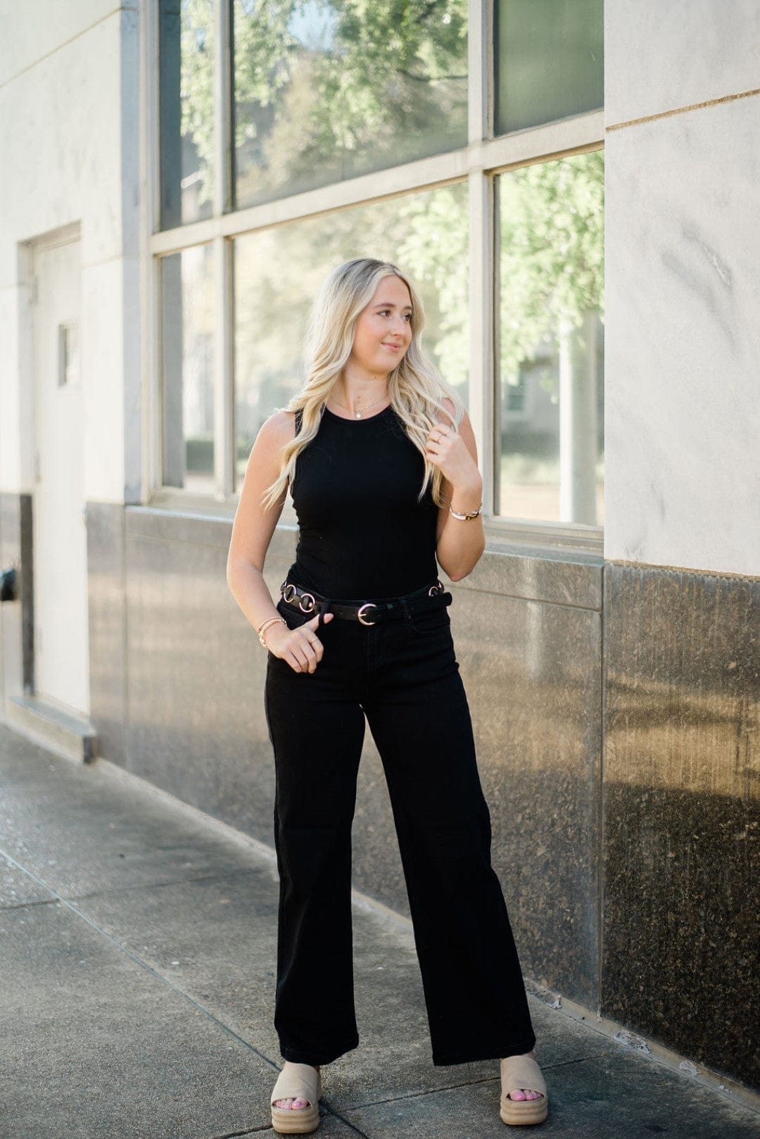 Black Sleeveless Bodysuit can be rewritten as Sleek Black Sleeveless Bodysuit for better Google SEO results.