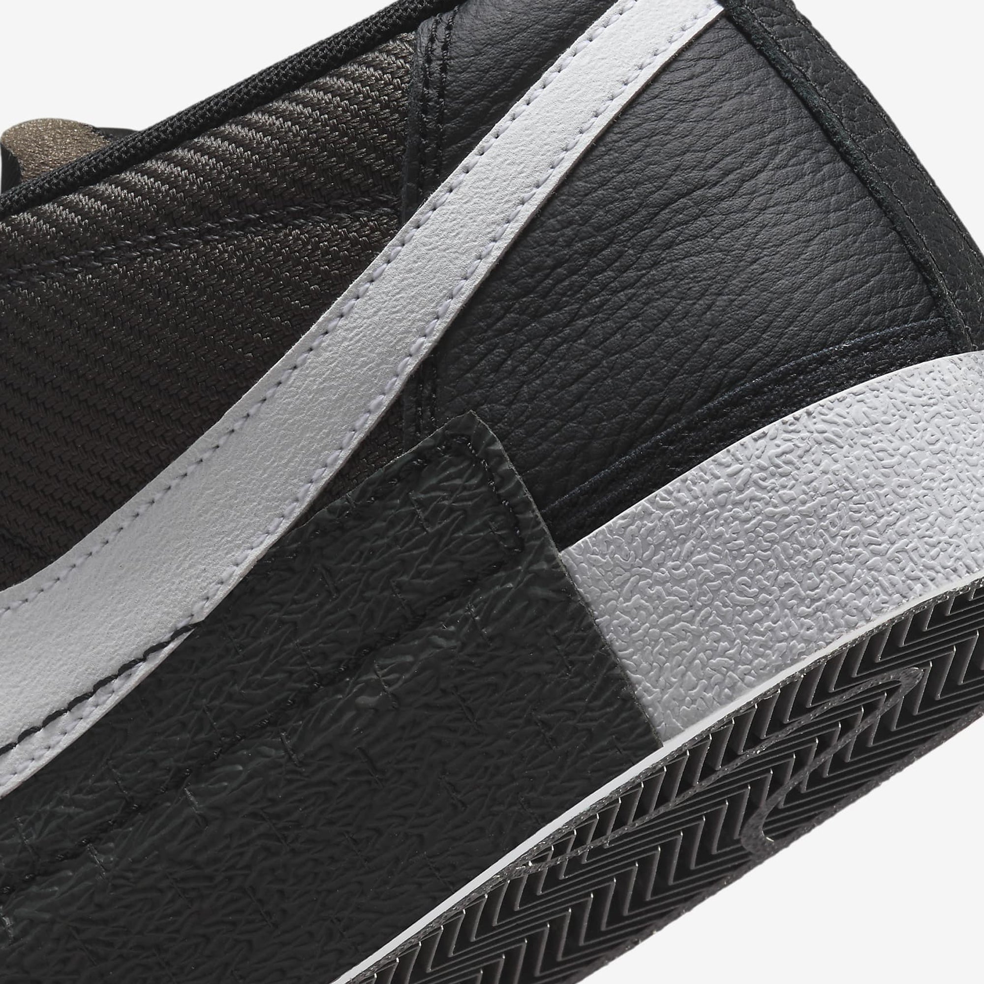 Blazer Low Pro Club sneakers in black, white, and anthracite.