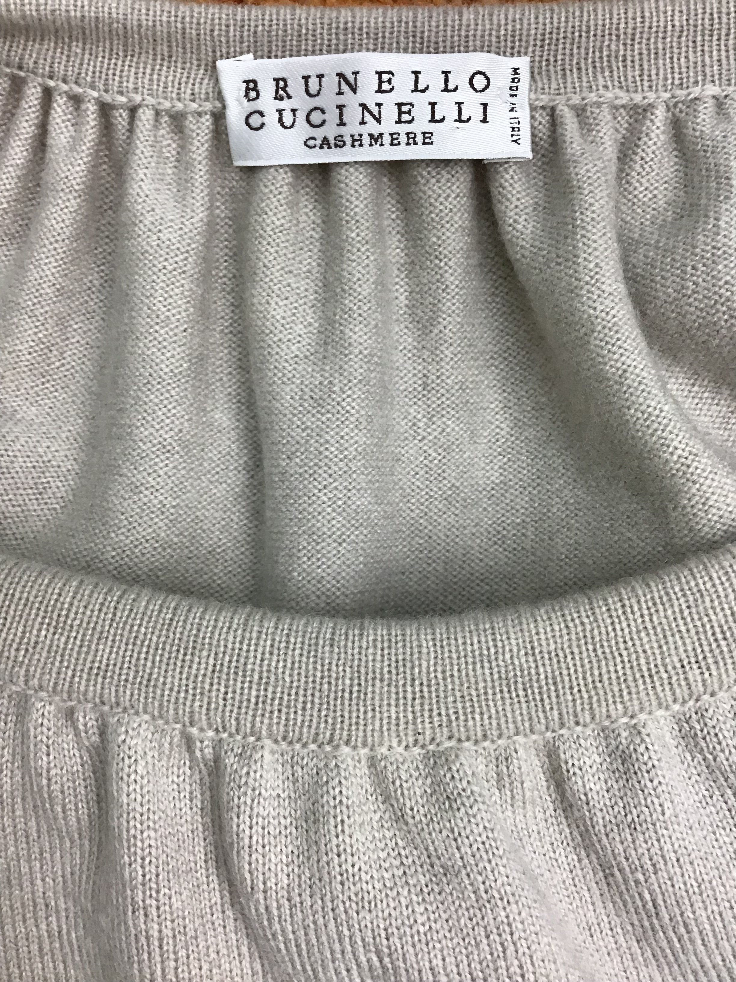 Brunello Cucinelli Cashmere Cold-Shoulder Sweater Keywords: Brunello Cucinelli, cashmere, cold-shoulder, sweater.