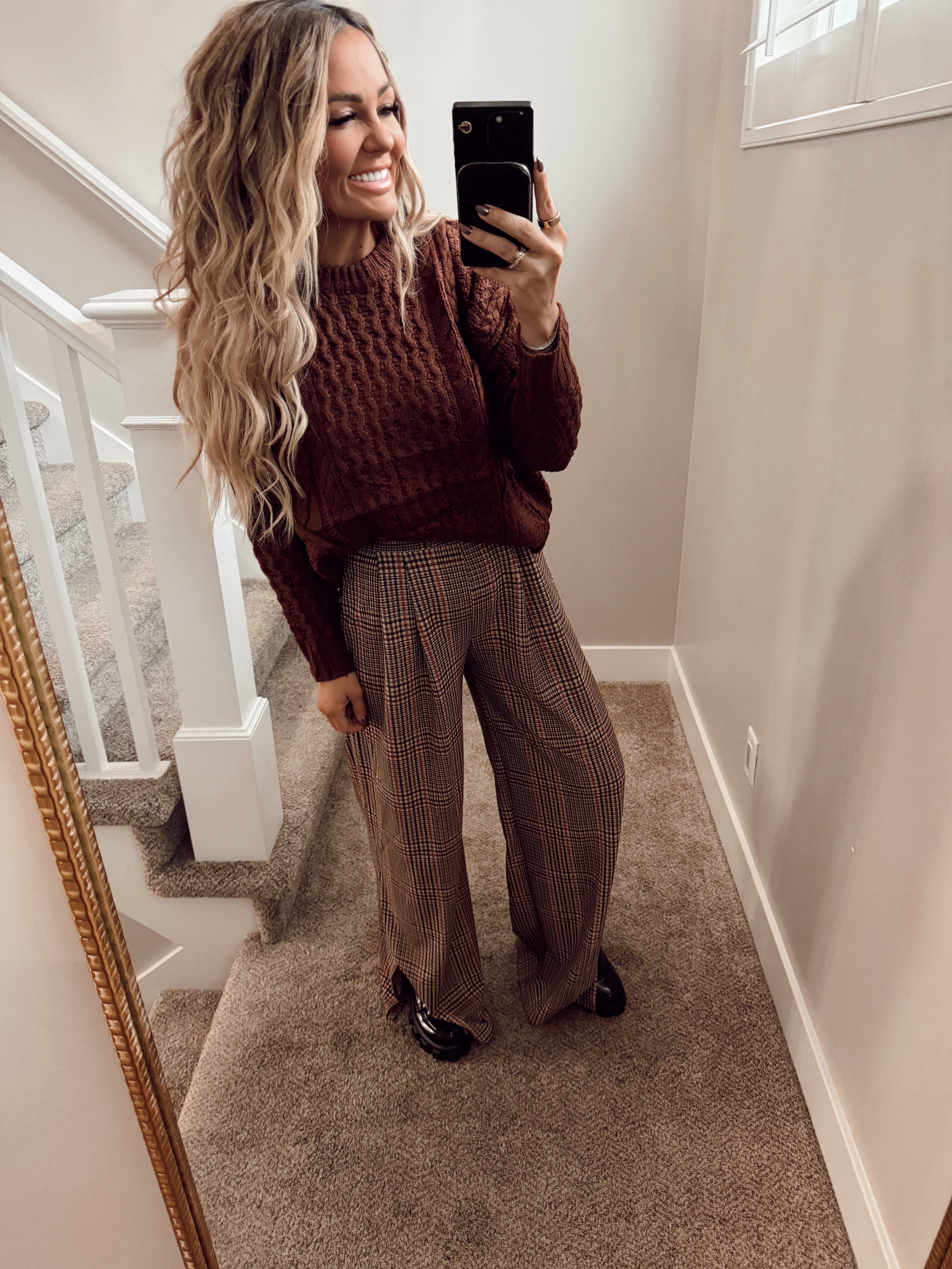 Maroon knit top.