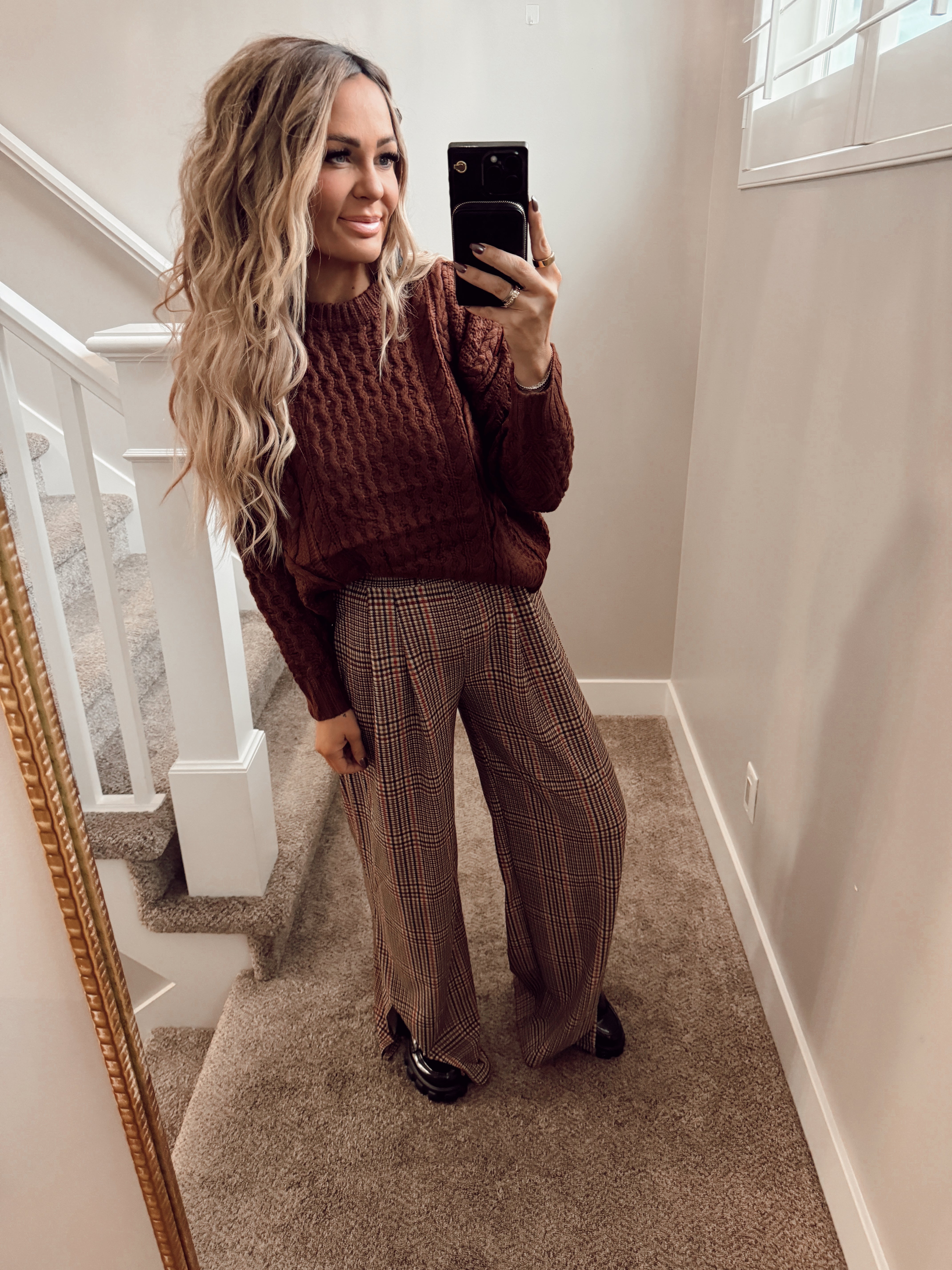 Maroon knit top.