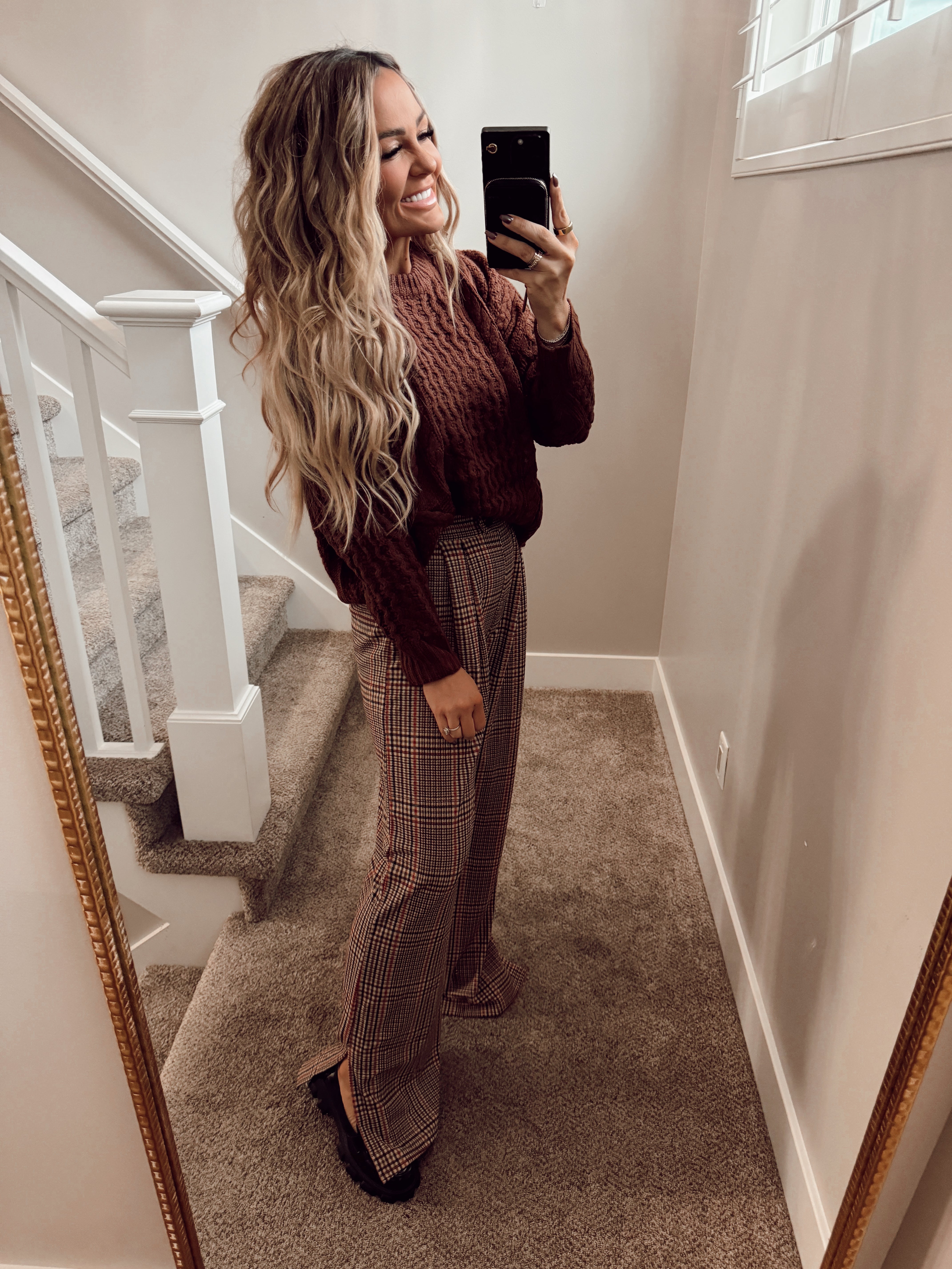 Maroon knit top.