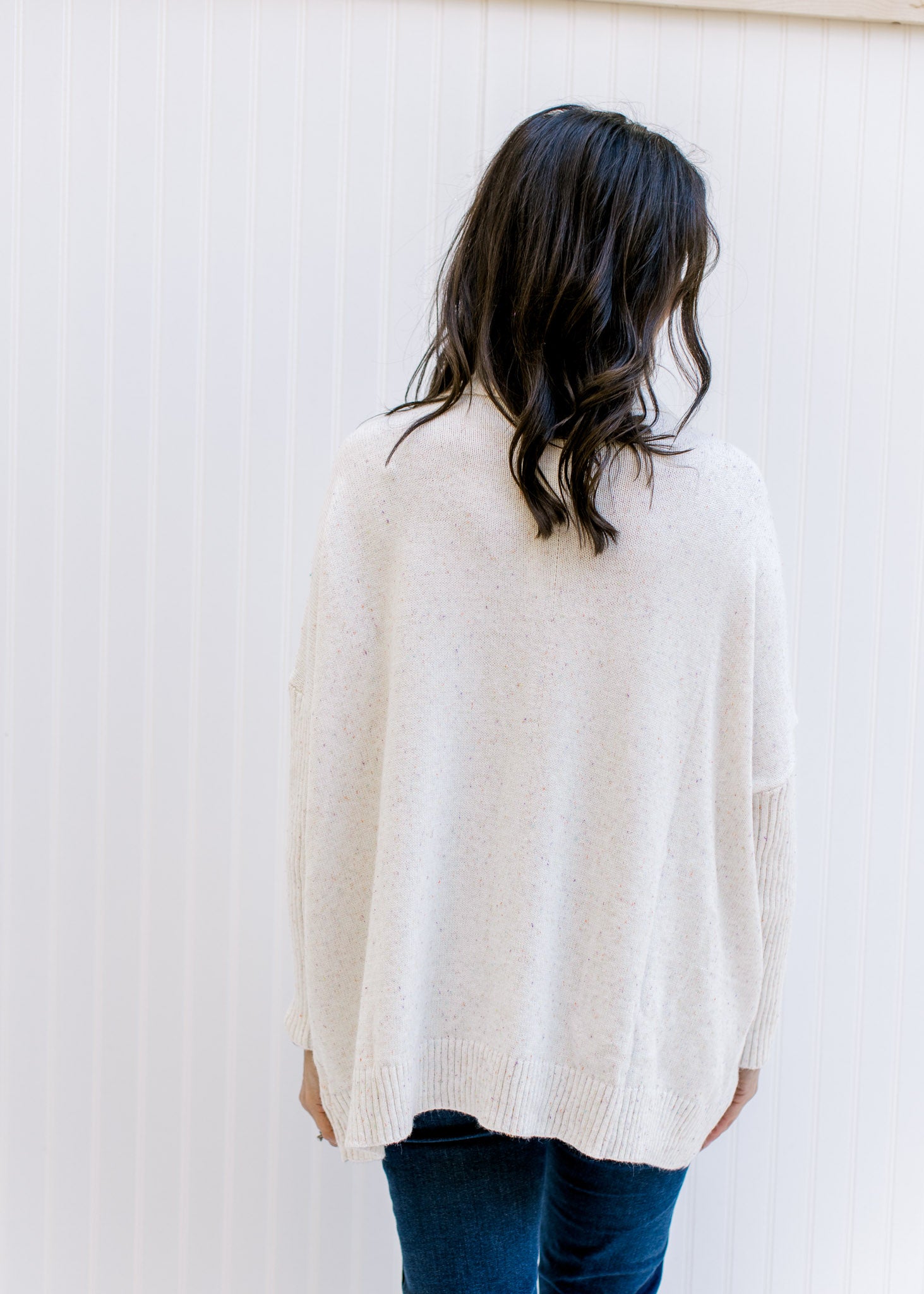 Off-White Sweater with Speckled Pattern