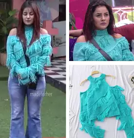 Shehnaaz Gill wearing a cold shoulder fringe sweater